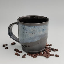Load image into Gallery viewer, Black mug with blue-gray