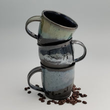 Load image into Gallery viewer, Black mug with blue-gray