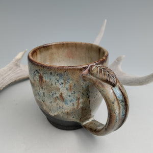 Earthy mug with blues