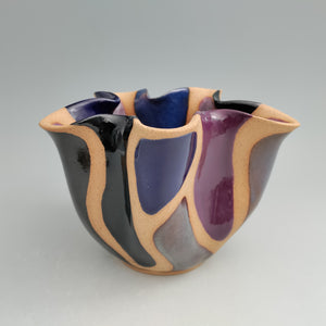 Altered vase with color blocks