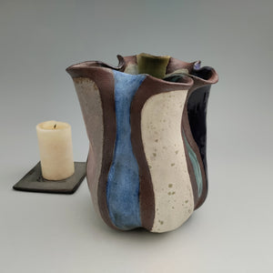 Altered vase with color blocks