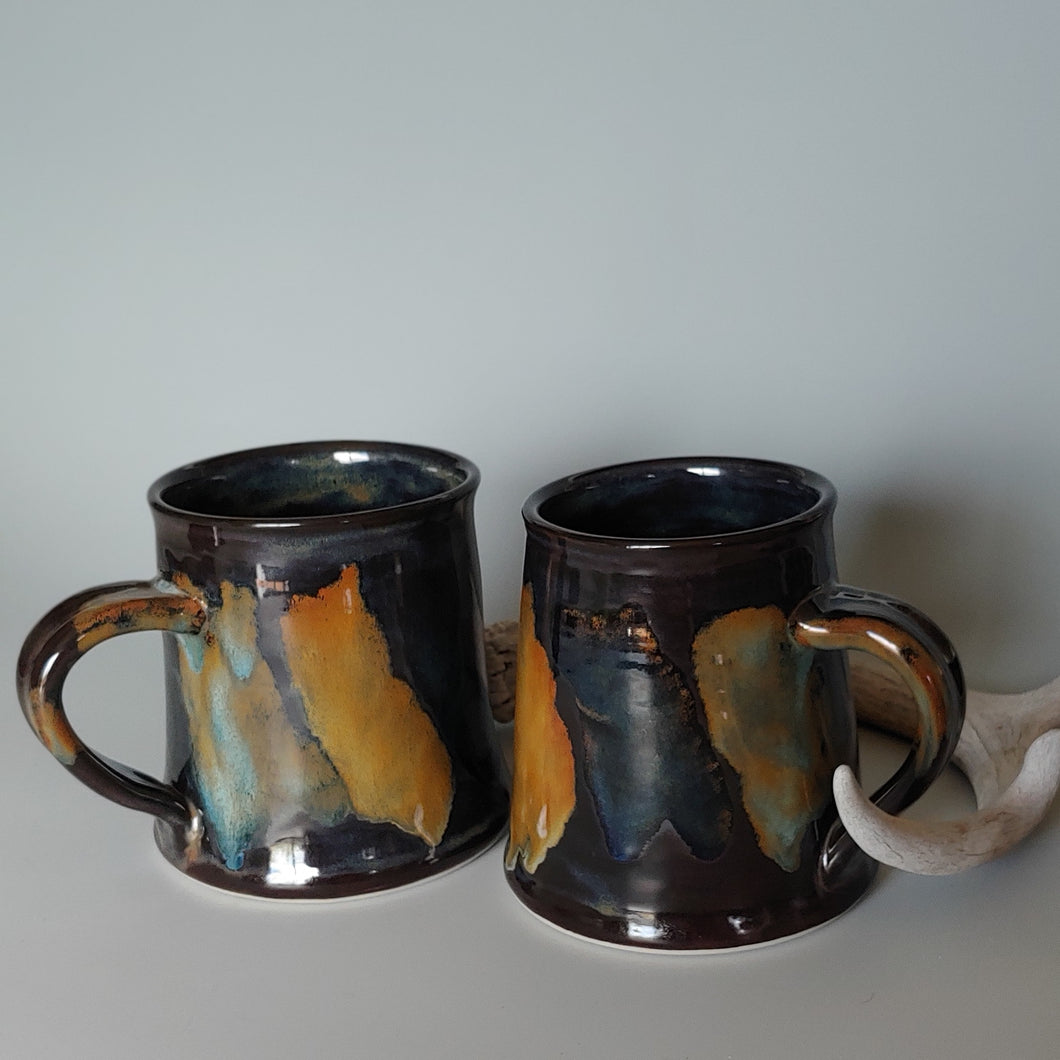 PAIR of Earthy beer steins