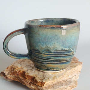 Mug -flowing river rock