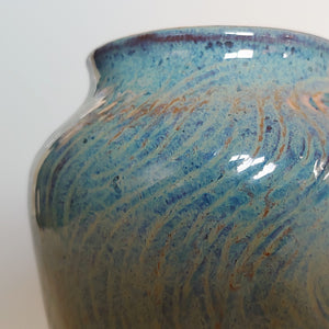 Blue vase, feathery texture