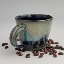 Load image into Gallery viewer, Black mug with green &amp; blue
