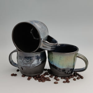 Black mug with green & blue