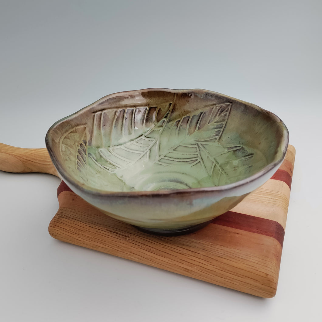 Green bowl, carved leaves